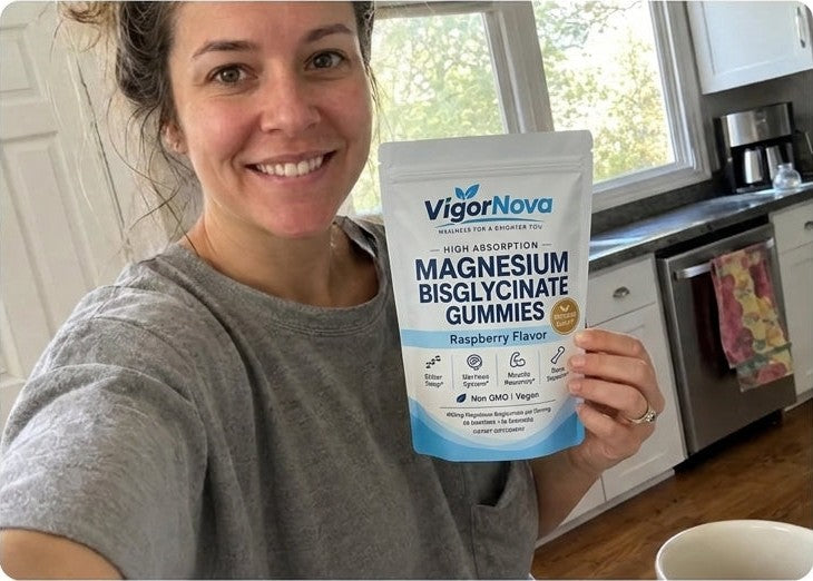 Woman holding VigorNova Magnesium Bisglycinate Gummies